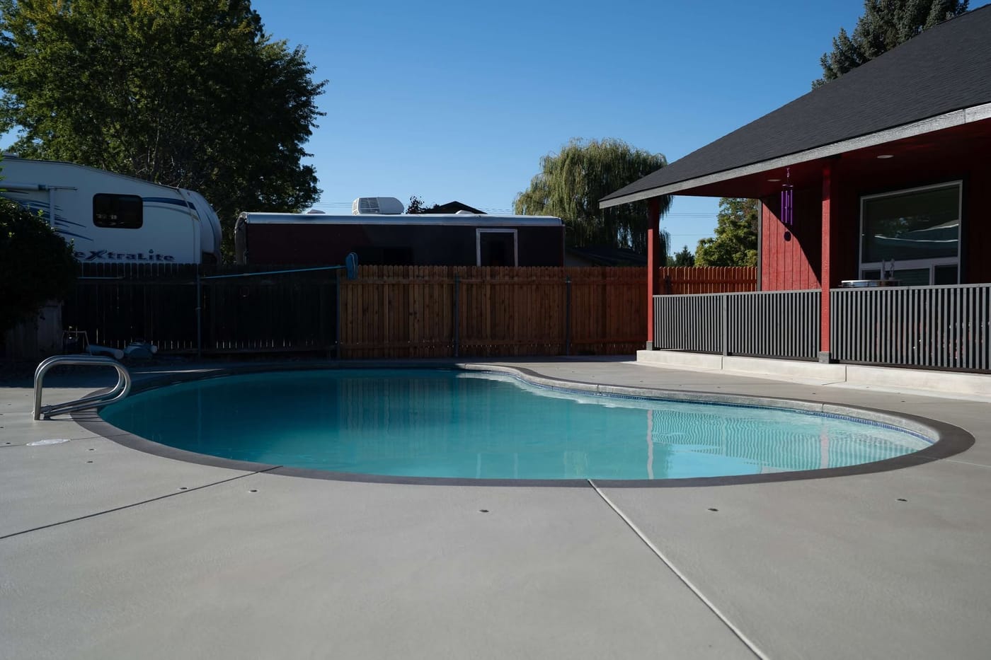 Pool deck concrete after outdoor coating work.