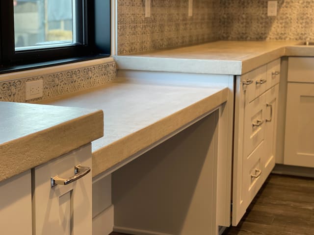 Light epoxy kitchen countertop coating with a clean stone-like finish.