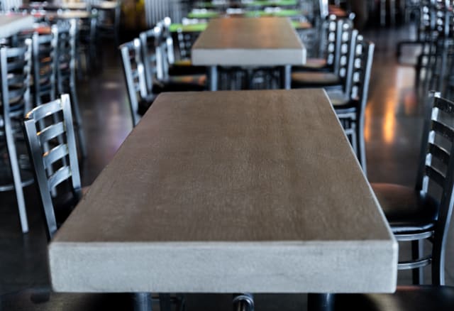 Restaurant tabletop with a warm decorative epoxy coating.