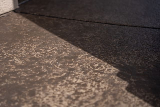 Outdoor patio concrete surface with a finished coating system.