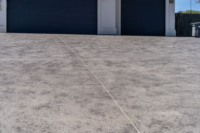 Outdoor concrete area with a clean decorative coating finish.