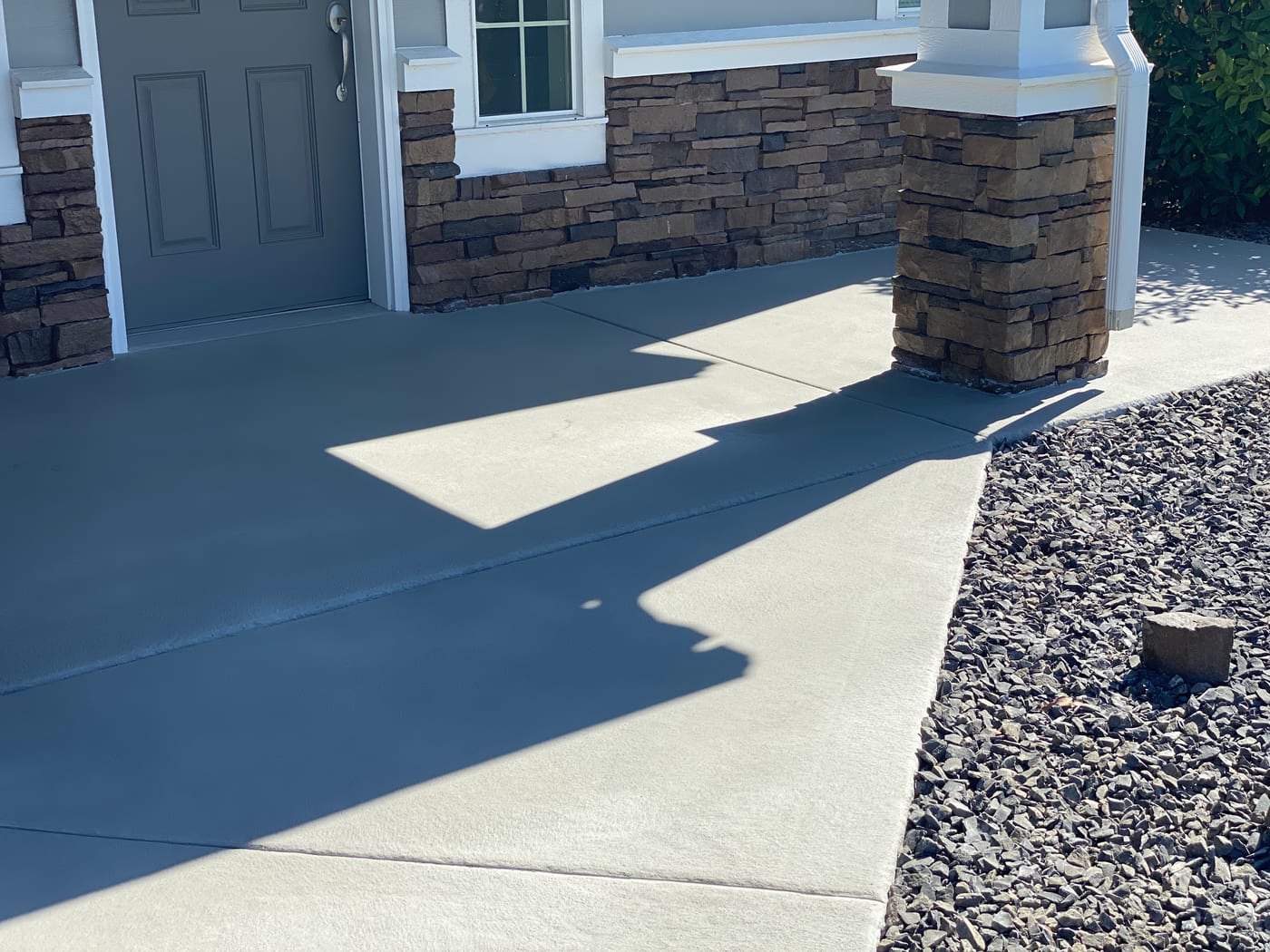 Concrete surface after repair and coating work.